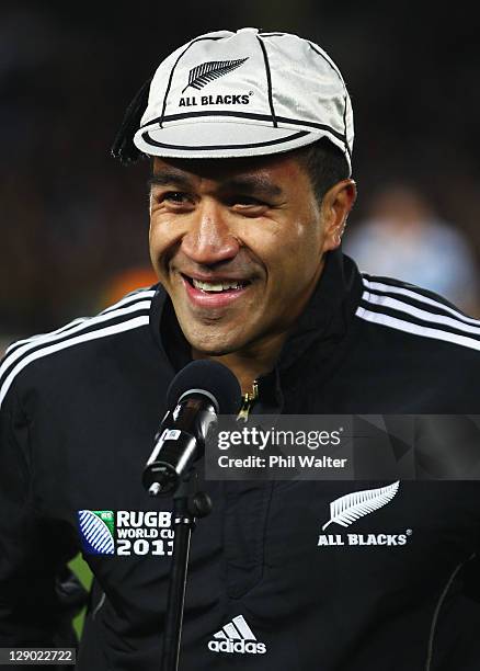 Mils Muliaina of the All Blacks talks after receiving his 100th test cap during quarter final four of the 2011 IRB Rugby World Cup between New...