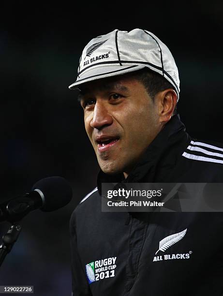Mils Muliaina of the All Blacks talks after receiving his 100th test cap during quarter final four of the 2011 IRB Rugby World Cup between New...