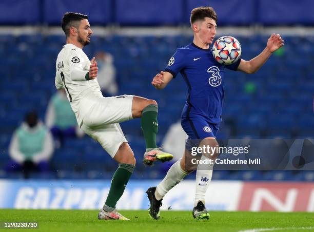 Billy Gilmour of Chelsea is challenged by Remy Cabella of Krasnodar during the UEFA Champions League Group E stage match between Chelsea FC and FC...