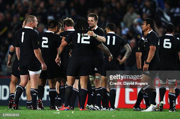 Richie McCaw of the All Blacks celebrates victory with Ma'a Nonu after quarter final four of the 2011 IRB Rugby World Cup between New Zealand and...