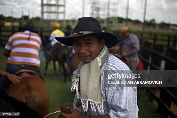 Llanero poses before a "Coleo" competition in Puerto Gaitan, Meta department, center Colombia on October 09, 2011. Coleo is a sport practiced in the...