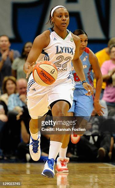 Monica Wright of the Minnsota Lynx brings the ball down court against the Atlanta Dream in Game One of the 2011 WNBA Finals on October 2, 2011 at...