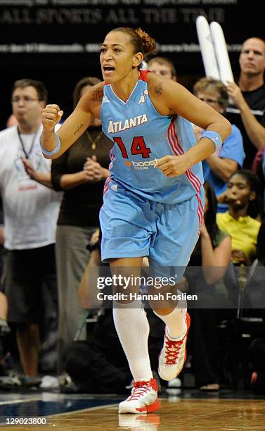 Erika de Souza of the Atlanta Dream celebrates in Game Two of the 2011 WNBA Finals against the Minnesota Lynx on October 5, 2011 at Target Center in...