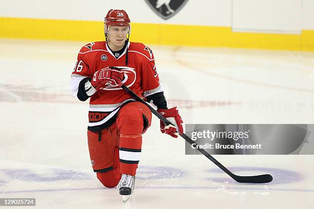 Jussi Jokinen of the Carolina Hurricanes skates in warmups prior to the game against the Tampa Bay Lightning at the RBC Center on October 7, 2011 in...