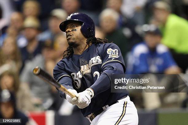 Rickie Weeks of the Milwaukee Brewers hits a 2-run home run in the bottom of the fourth inning against the St. Louis Cardinals during Game Two of the...