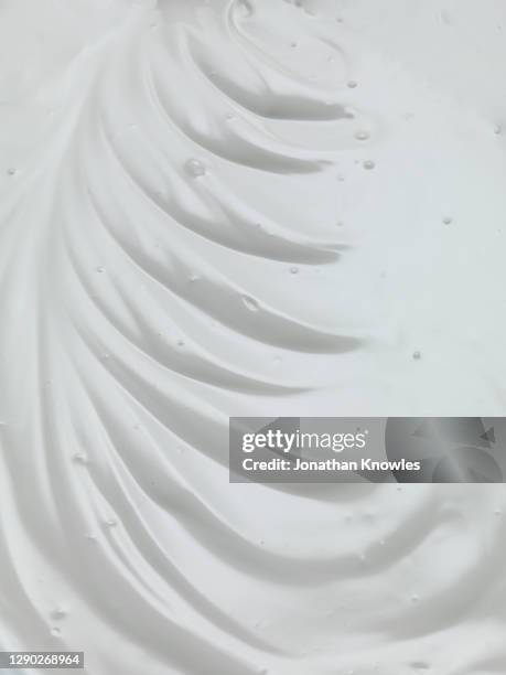 ripples in yogurt - jogurt textur stock-fotos und bilder