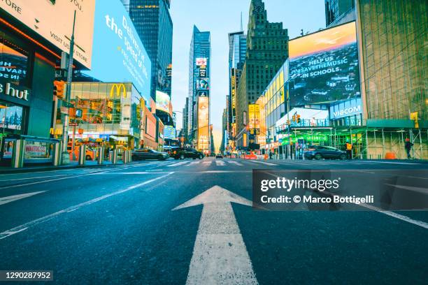 road sign leading to times square, new york city - times square stock pictures, royalty-free photos & images