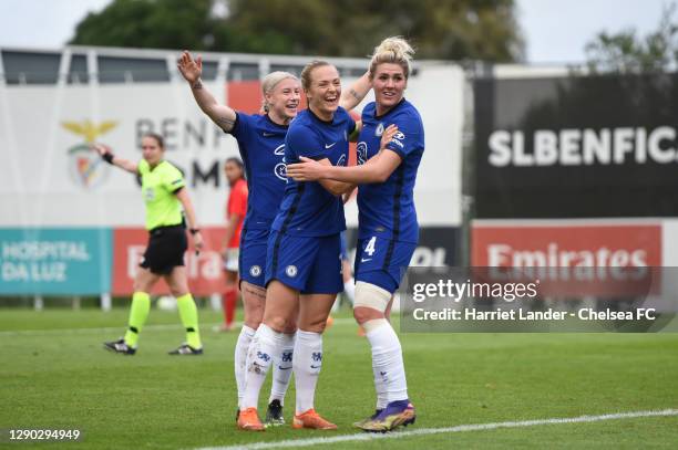 Millie Bright of Chelsea celebrates with teammates Bethany England and Magdalena Eriksson after scoring her team's second goal during the UEFA...