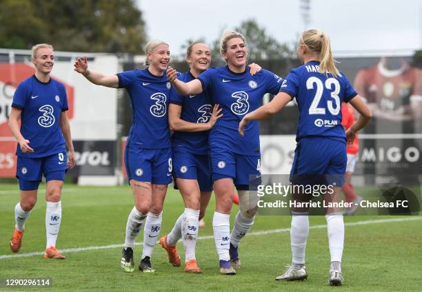 Millie Bright of Chelsea celebrates with teammates Bethany England, Magdalena Eriksson and Pernille Harder after scoring her team's second goal...