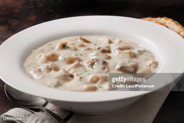 creamy baked potato soup with crusty bread - cheese sauce stock pictures, royalty-free photos & images