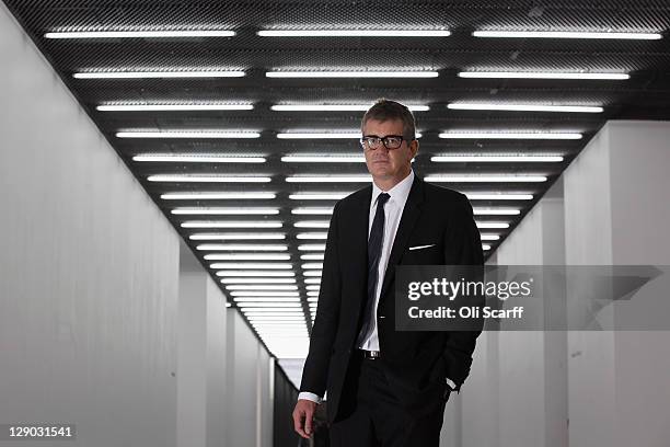 Jay Jopling, owner of the White Cube galleries, poses for a photograph in the new White Cube gallery in Bermondsey on October 11, 2011 in London,...