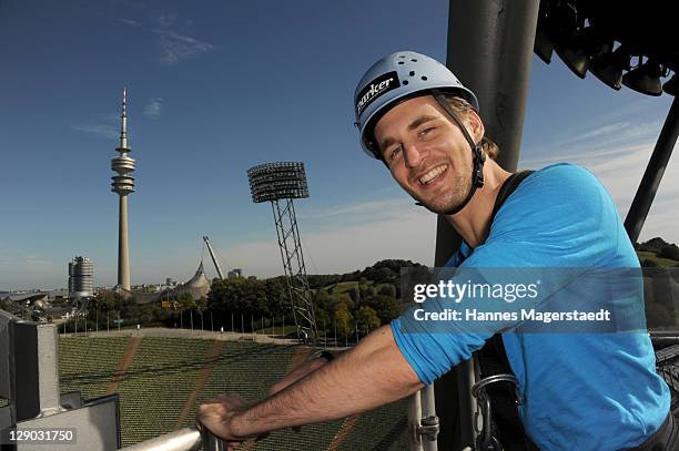 Musical Star Alexander Klaws prepares to fly on Munich Flying Fox above the Munich Olympiastadion on October 11, 2011 in Munich, Germany.