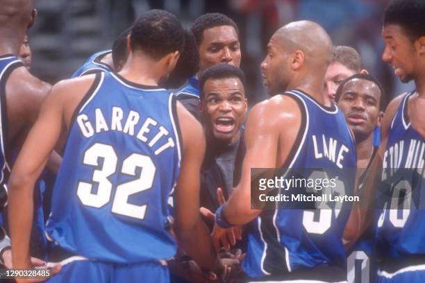 Head coach Tommy Amaker of the Seton Hall Pirates talks to his players during a college basketball against the Georgetown Hoyas at MCI Center on...