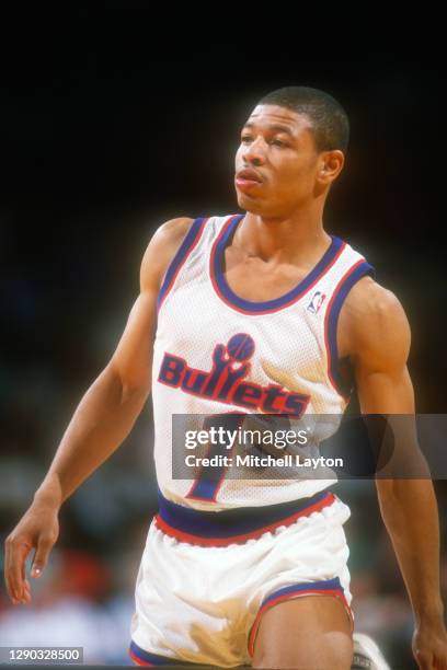 Tyrone Bogues of the Washington Bullets looks on during a basketball game against the Atlanta Hawks at the Capital Centre on March 24, 1988 in...