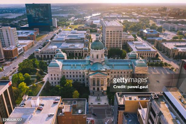 aerial view of indianapolis downtown with statehouse in indiana - indianapolis sunset stock pictures, royalty-free photos & images