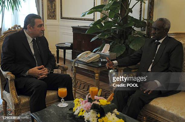Egyptian Prime Minister Essam Sharaf meets with Ali Osman, the Sudanese first deputy, in Cairo on October 11 to discuss bilateral relations between...
