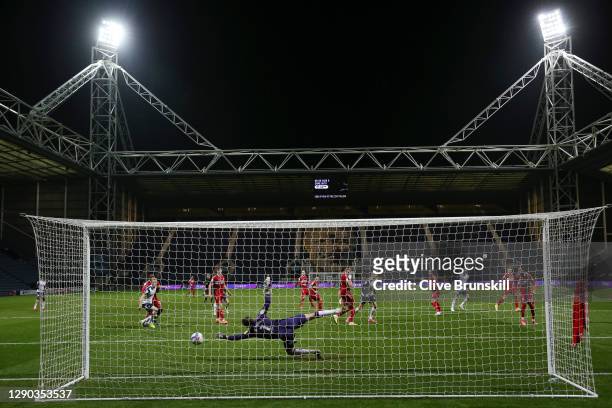 Brad Potts of Preston North End scores their sides first goal past Marcus Bettinelli of Middlesborough during the Sky Bet Championship match between...