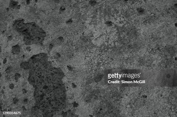 pitted surface of a concrete driveway - soot stock pictures, royalty-free photos & images