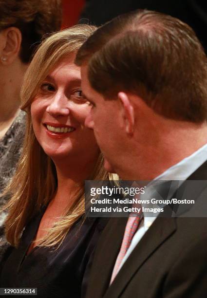 Flanked by girlfriend Lorrie Higgins, Mayor Elect Walsh enjoys an Interfaith Prayer Celebration for the Inauguration of Walsh at Old South Church on...