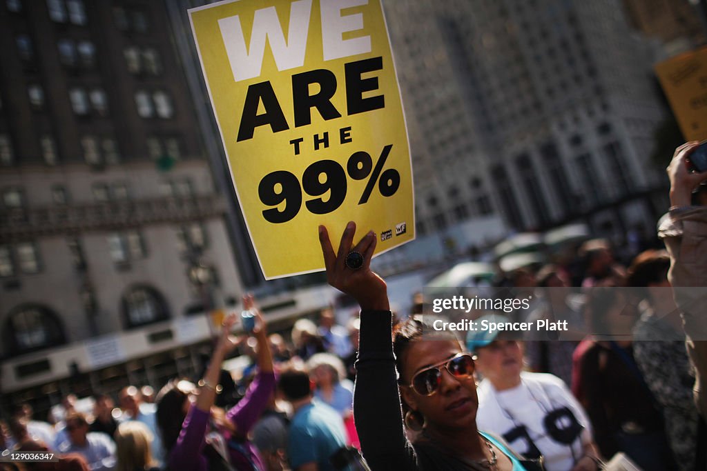 Occupy Wall Street Protestors March Down New York's Fifth Avenue