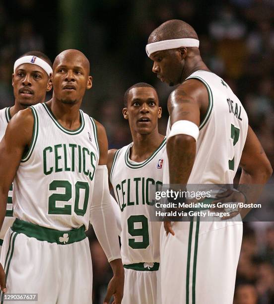 Boston Celtics small forward Paul Pierce , Boston Celtics shooting guard Ray Allen , Boston Celtics point guard Rajon Rondo and Boston Celtics center...