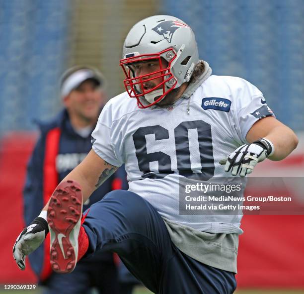 Center David Andrews and the Patriots warm up for practice at Gillette Stadium. Thursday, January 11, 2018. Staff photo by John Wilcox.