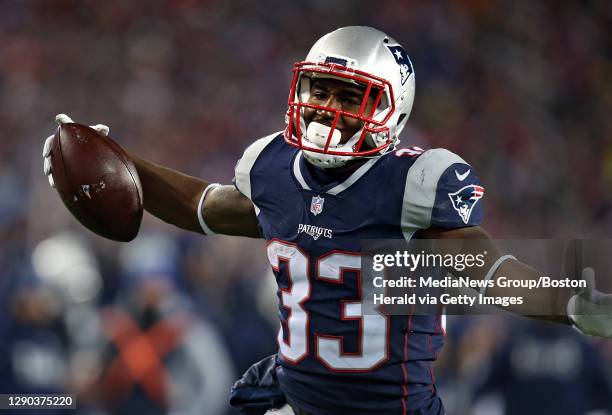 New England Patriots running back Dion Lewis celebrates a touchdown that was called back after review during the AFC Divisional playoff game at...