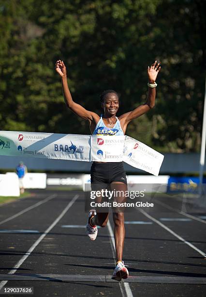 The top female finisher Janet Cherobon-Bawcom, of Rome, Ga., crossed the finish line. The Boston Athletic Association 2011 Half Marathon kicked off...