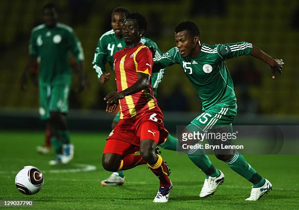 Ikechukwu Uche of Nigeria battles with Anthony Annan of Ghana during the International Friendly between Ghana and Nigeria at Vicarage Road on October...