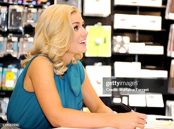 Katherine Jenkins signs autographs while promoting her new album 'Daydream' at HMV on October 11, 2011 in The Trafford Centre, Manchester, England.