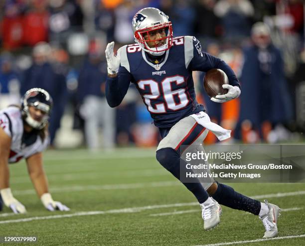 New England Patriots cornerback Logan Ryan intercepts a pass during the fourth quarter of the AFC Divisional Playoff game between the New England...