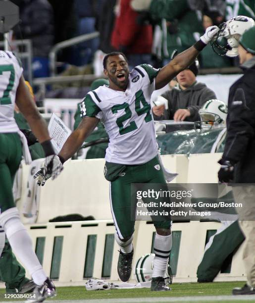 Foxboro, MA)New York Jets cornerback Darrelle Revis celebrates while "flying" on the sideline late in the 4th quarterThe New England Patriots take on...