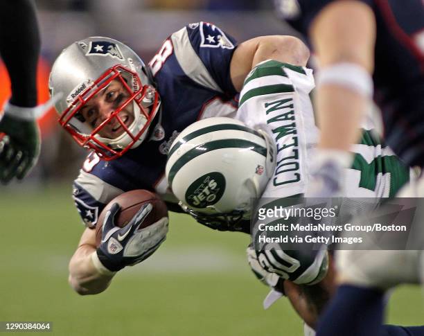 Foxboro, MA)New England Patriots wide receiver Wes Welker is hauled down by New York Jets cornerback Drew Coleman in the 4th quarter.The New England...