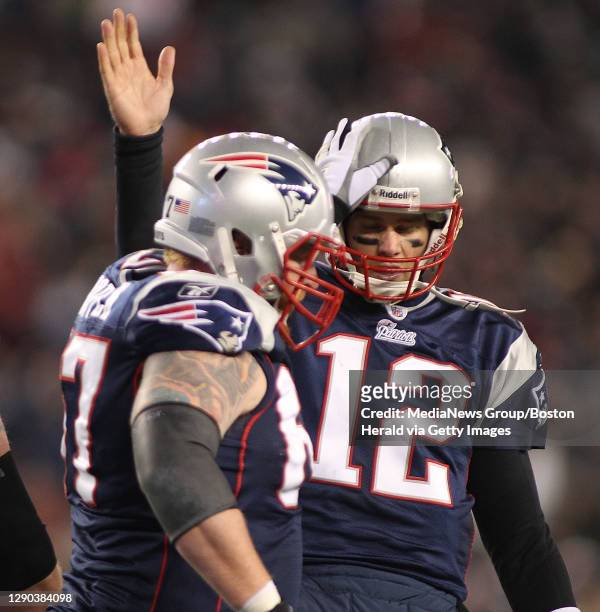 Foxboro, MA)New England Patriots quarterback Tom Brady and New England Patriots center Dan Koppen celebrate td by New England Patriots tight end Alge...