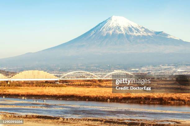 fuji mountain and the bridge across fuji river, shizuoka, japan - tokaido shinkansen line stock pictures, royalty-free photos & images