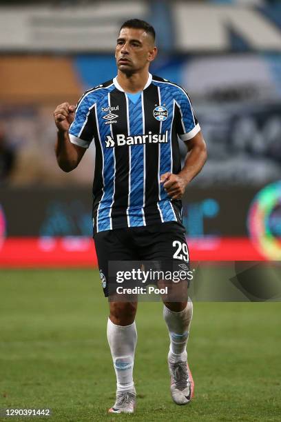 Diego Souza of Gremio celebrates after scoring the first goal of his team during a first leg match between Gremio and Santos as part of Copa CONMEBOL...