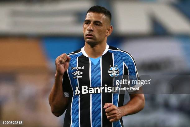 Diego Souza of Gremio celebrates after scoring the first goal of his team during a first leg match between Gremio and Santos as part of Copa CONMEBOL...