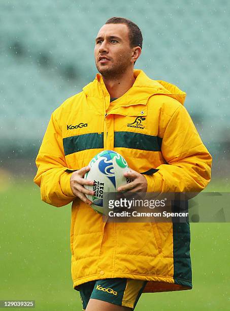 Quade Cooper of the Wallabies warms up during an Australia IRB Rugby World Cup 2011 training session at North Harbour Stadium on October 12, 2011 in...