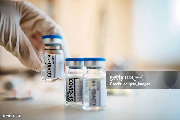 vial of coronavirus vaccine - covid 19 vaccine stock pictures, royalty-free photos & images