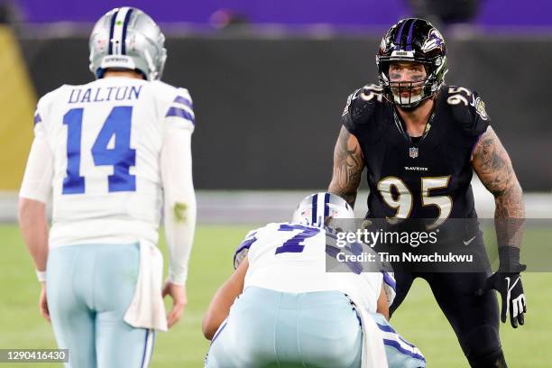 Derek Wolfe of the Baltimore Ravens waits for a snap against the Dallas Cowboys at M&T Bank Stadium on December 08, 2020 in Baltimore, Maryland.