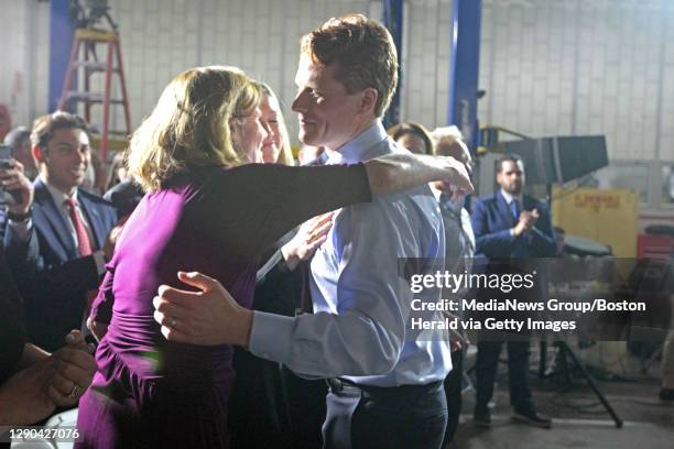 Mass Rep. Joe Kennedy III hug his mom Sheila Brewster Rauch at his rebuttal speech at Diman Vocational School. Tuesday, January 30, 2018.