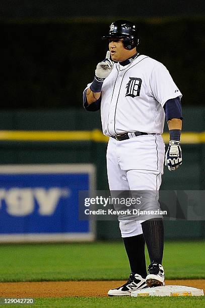 Miguel Cabrera of the Detroit Tigers reacts after an RBI double in the fifth inning to take a 2-1 lead in Game Three of the American League...