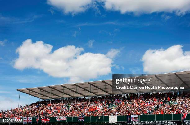 British fans in the main start and finish straight grandstand at the 2010 British Grand Prix, Silverstone Circuit, England, United Kingdom, on the 11...