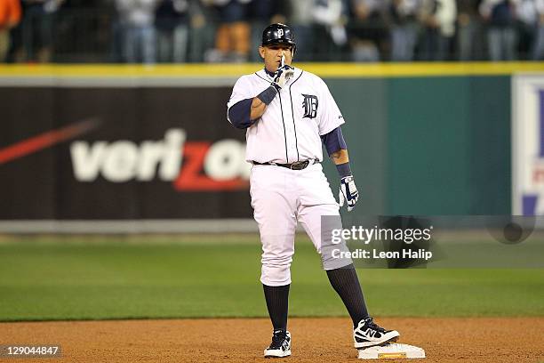 Miguel Cabrera of the Detroit Tigers reacts after an RBI double in the fifth inning to take a 2-1 lead in Game Three of the American League...