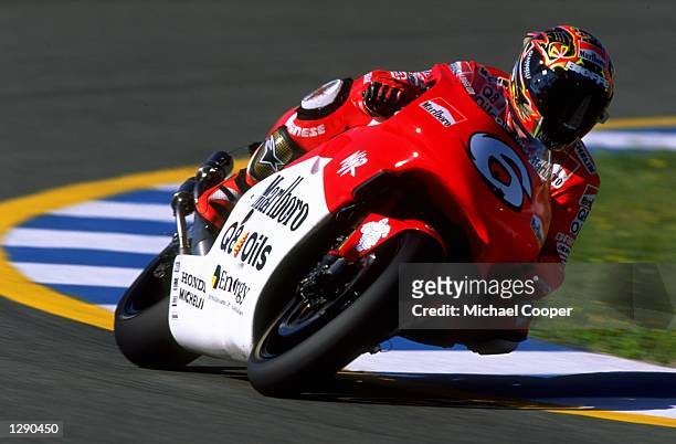 Massimiliano Biaggi of Italy and Marlboro Honda takes a corner in the 500cc race during the 1998 Spanish Motorcycle Grand Prix at Jerez, Spain. \...