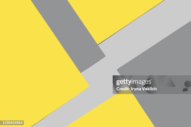 abstract geometric bright illuminating yellow and gray colours background. - gray color swatches stock pictures, royalty-free photos & images