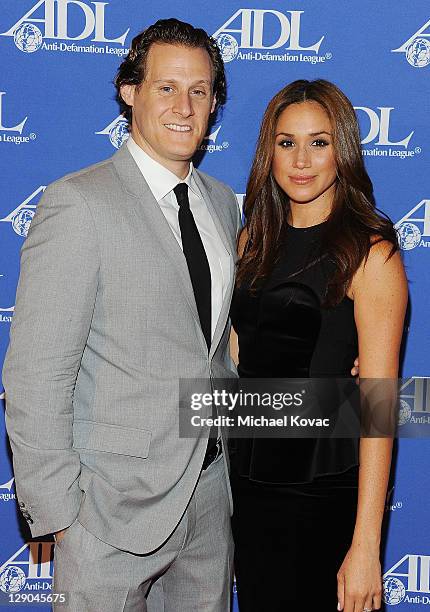 Trevor Engelson and wife actress Meghan Markle arrives at the Anti-Defamation League Entertainment Industry Awards Dinner Honoring Ryan Kavanaugh at...