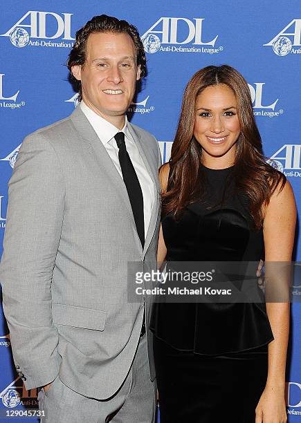 Trevor Engelson and wife actress Meghan Markle arrives at the Anti-Defamation League Entertainment Industry Awards Dinner Honoring Ryan Kavanaugh at...
