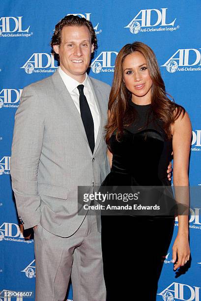 Actress Meghan Markle and her husband Trevor Engelson arrive at the Anti-Defamation League Entertainment Industry Awards Dinner at the Beverly Hilton...