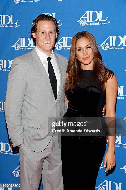 Actress Meghan Markle and her husband Trevor Engelson arrive at the Anti-Defamation League Entertainment Industry Awards Dinner at the Beverly Hilton...